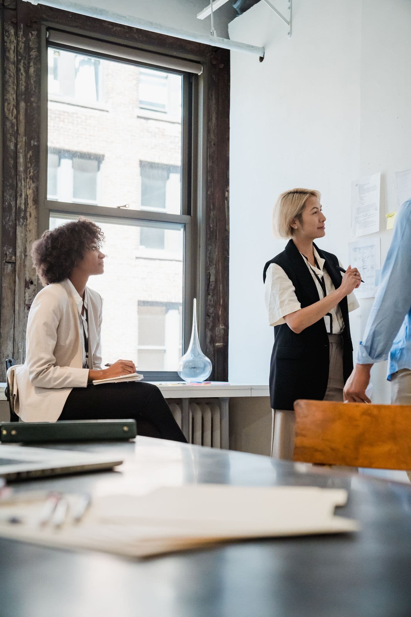 A team working together in a bright open-plan office
